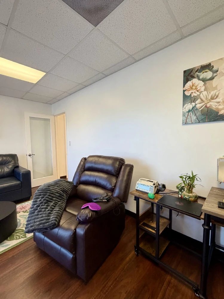 Patient receiving ketamine infusion therapy in a calm and comfortable clinical setting